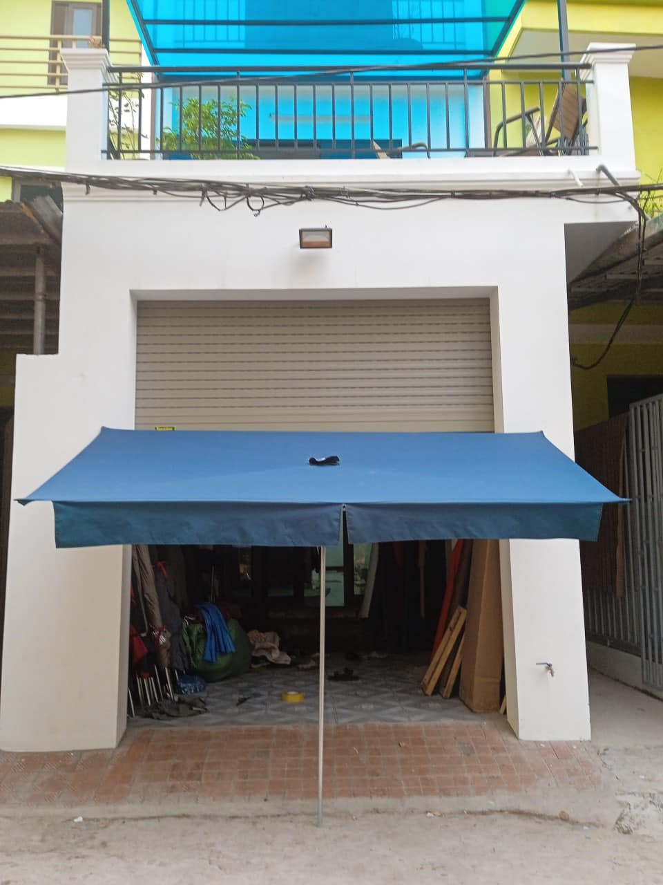 Ô che mưa bán hàng